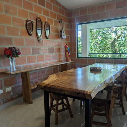 Dining area with wooden table and chairs